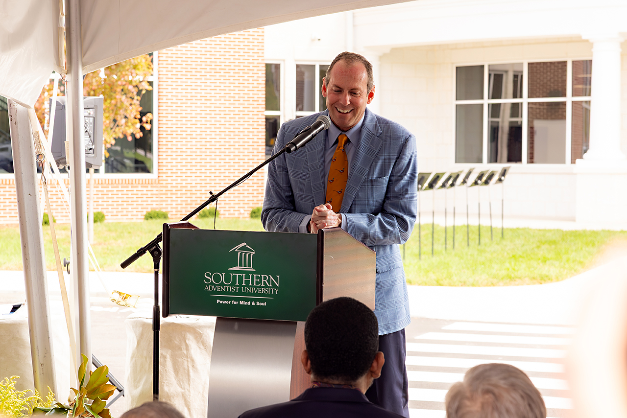 Campaign chair Franklin Farrow speaks at the Ruth McKee School of Business grand opening.