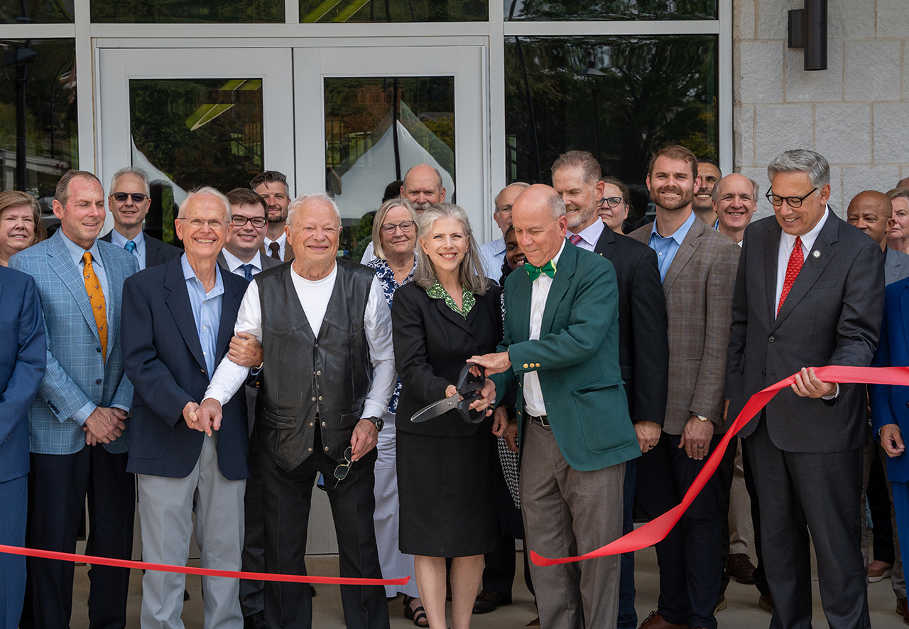 The official ribbon cutting at the Ruth McKee School of Business grand opening.