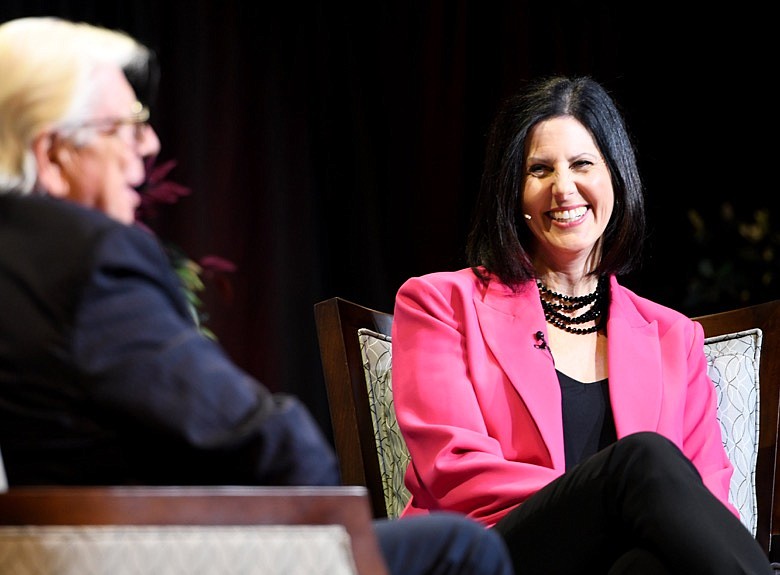 Interviewer Alison Levovitz smiles as Carl Bernstein answers a question
