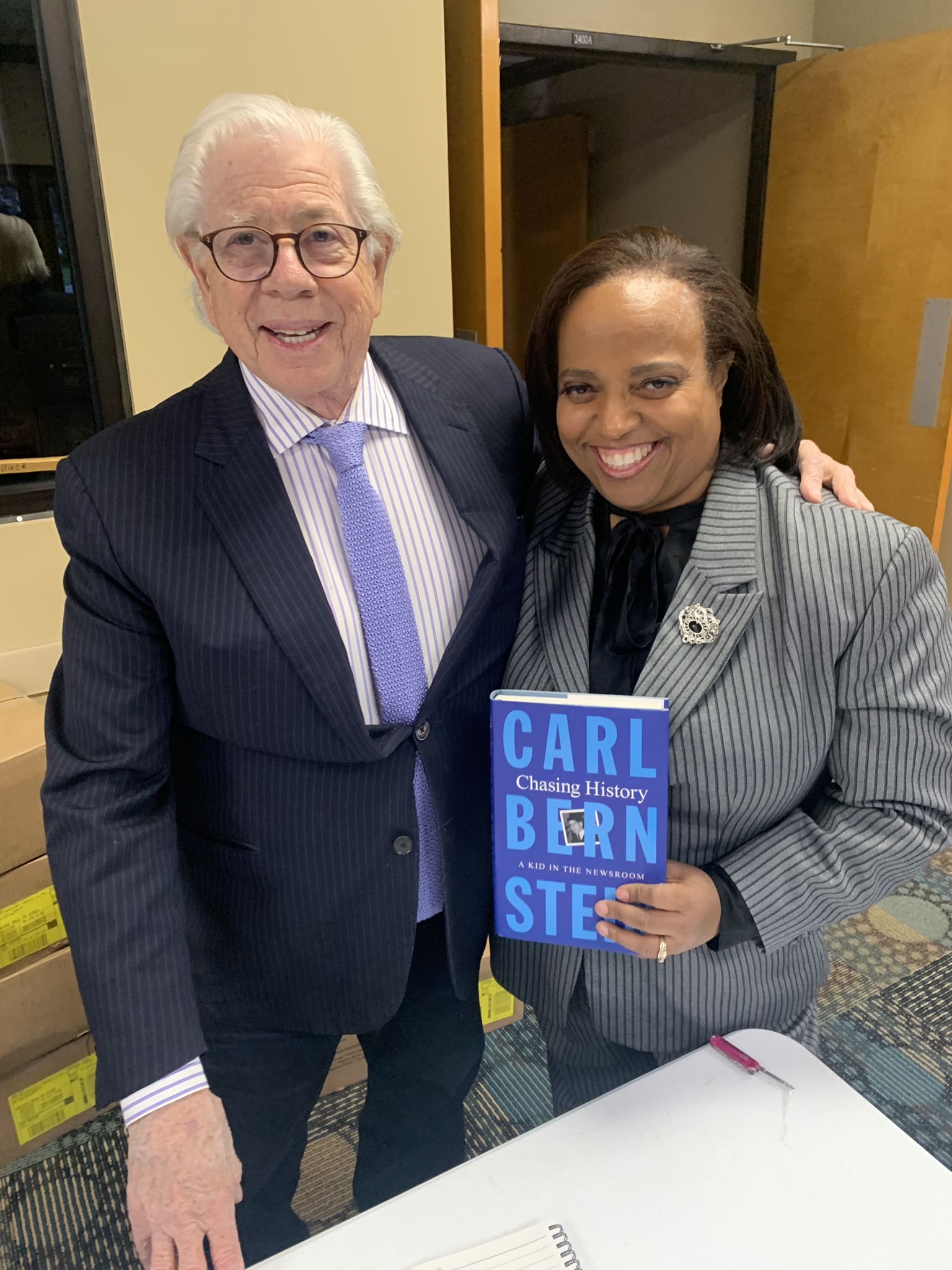 Carl Bernstein talked to guests while signing his books 