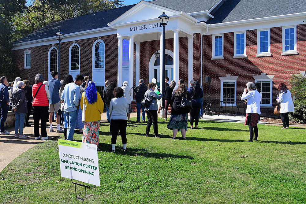 People standing outside simulation center