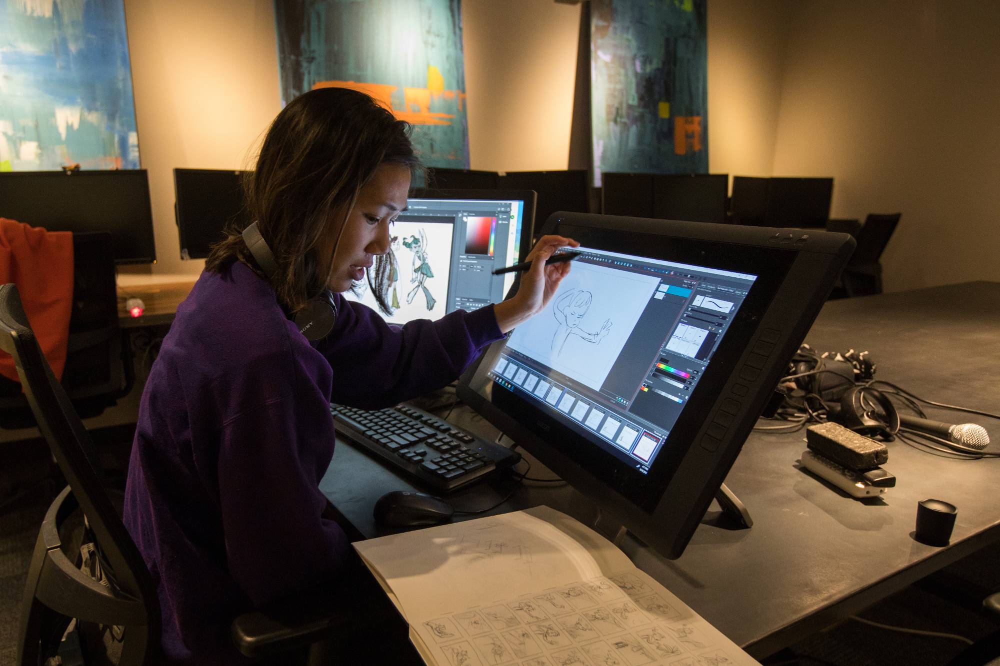 An animator sketches a character design.