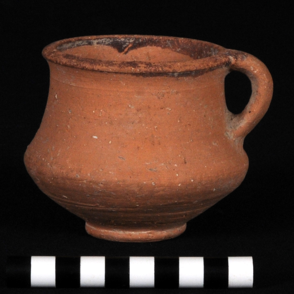 Miniature with brown painted rim