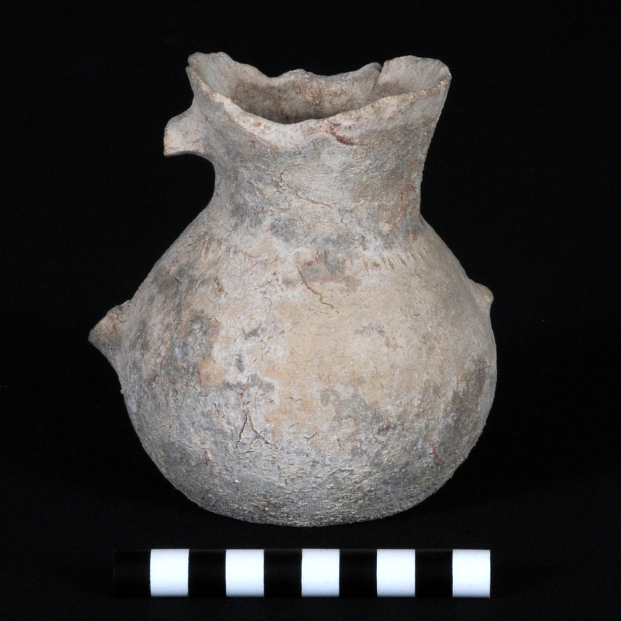 a grey flask pitcher