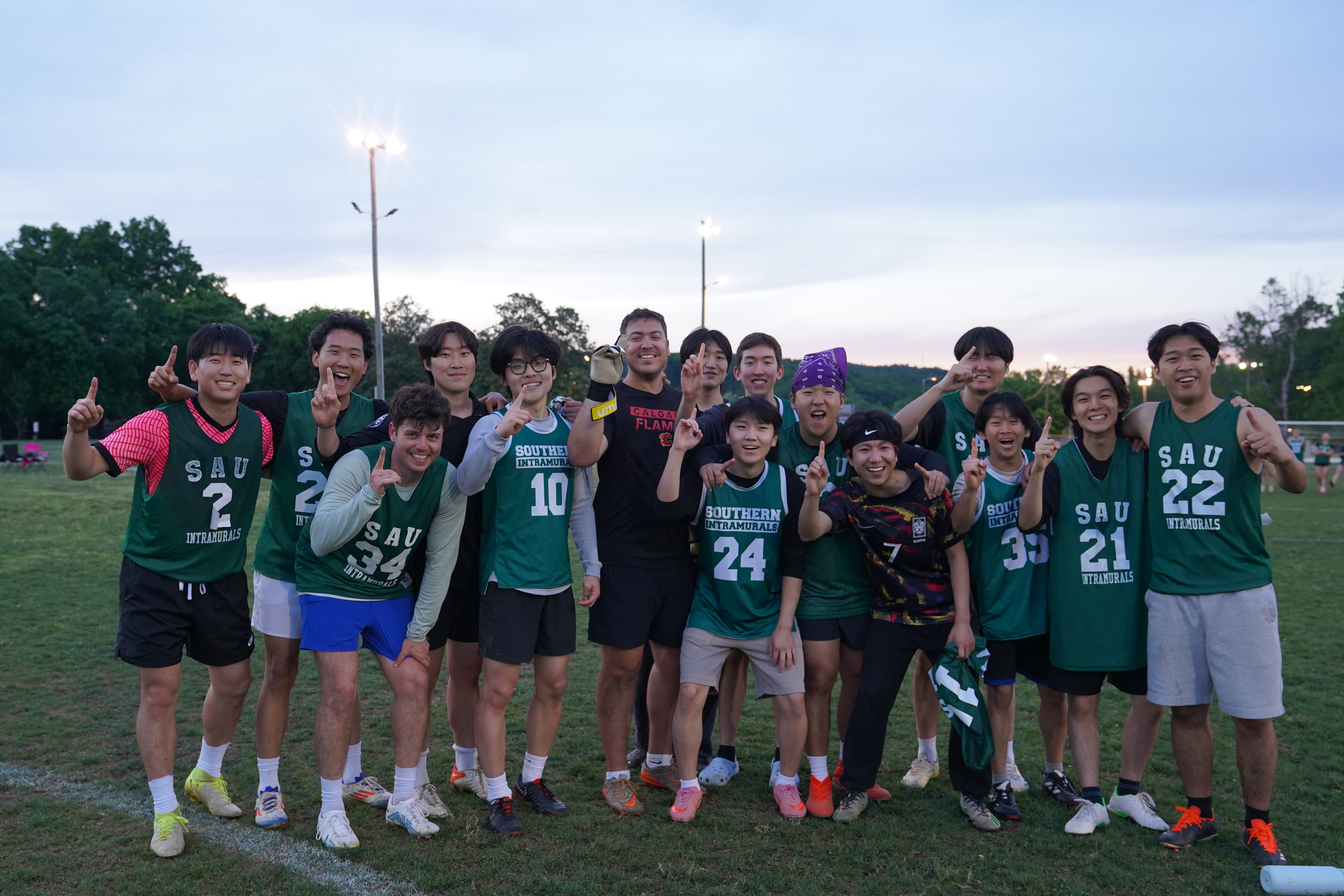 KOALAFC posing on a field after winning the championship