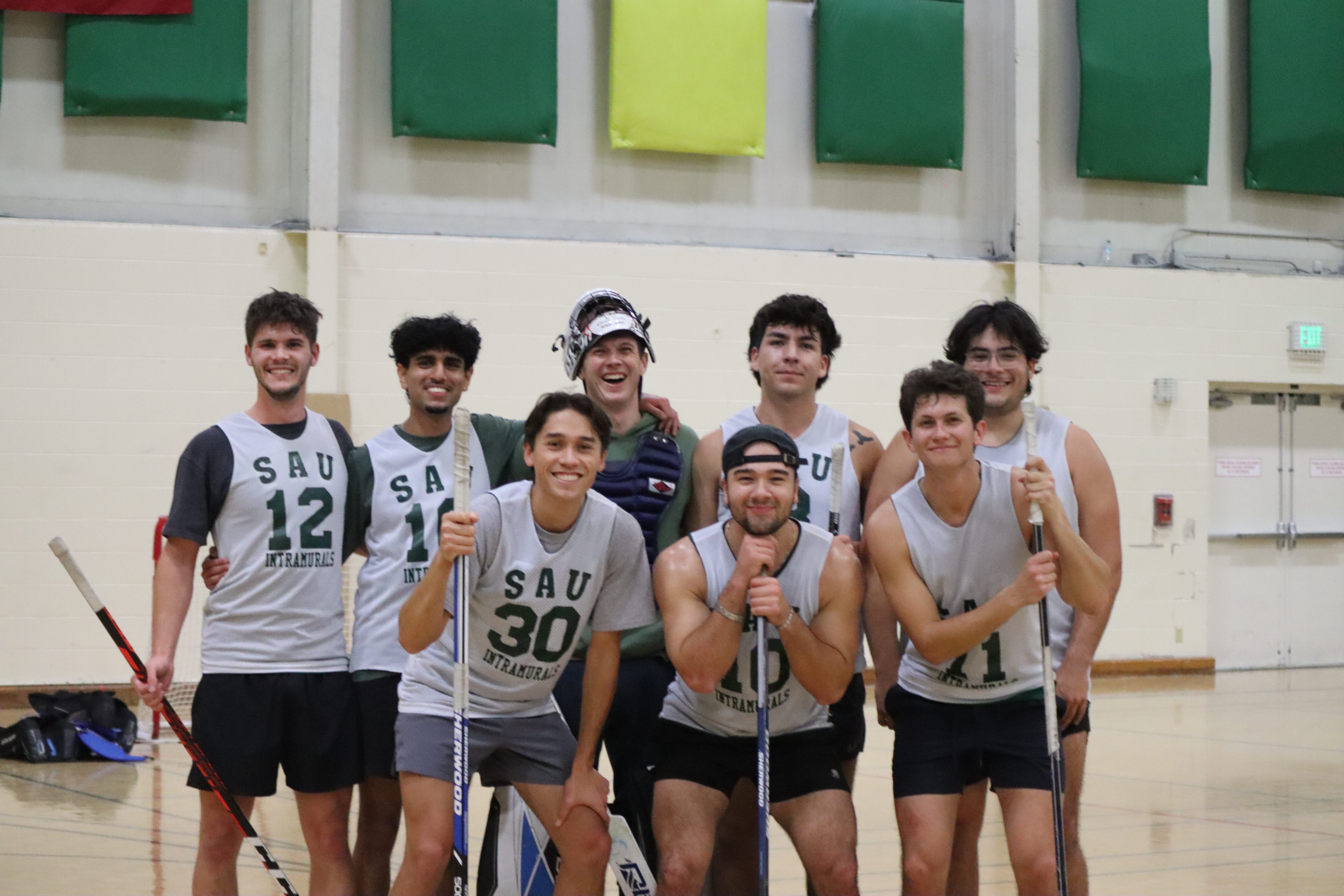 LoveMuffins posing on a court after winning the championship