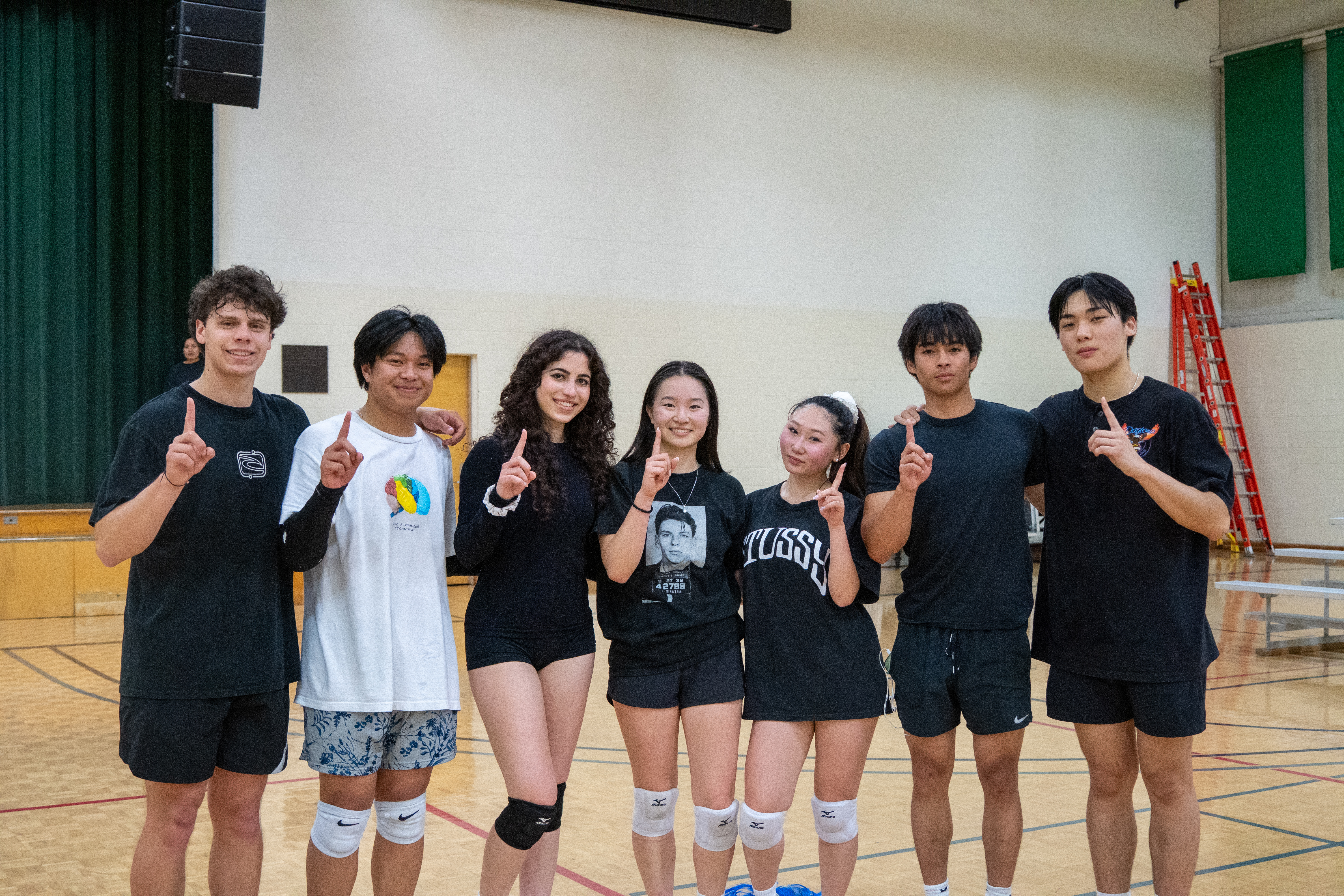 WeKnowBall posing on a court after winning the championship
