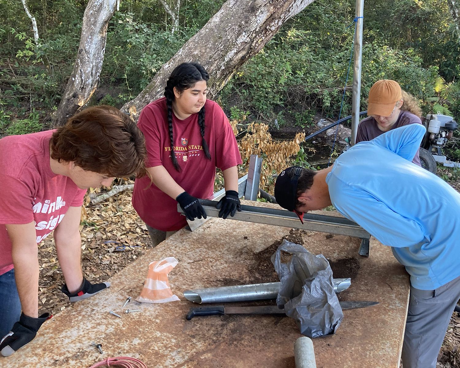 Southern Adventist University engineering students work on a project during a mission trip