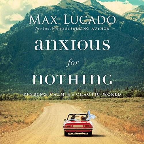 Image of book cover with car driving on road towards a mountain in the background