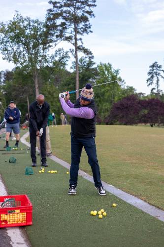 Golfer on the driving green