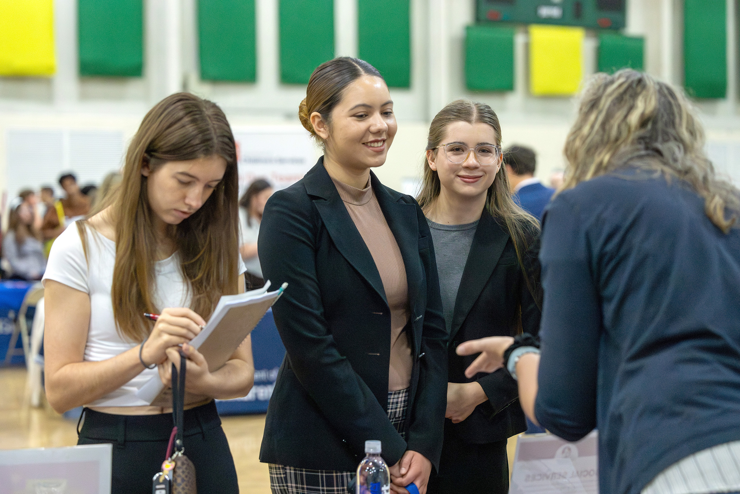 a student talks with a local professional at Meet the Firms
