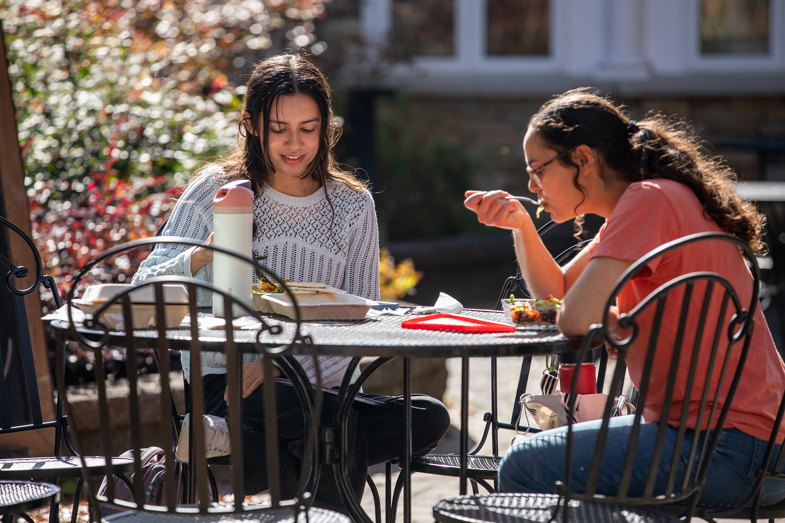 students eat outdoors