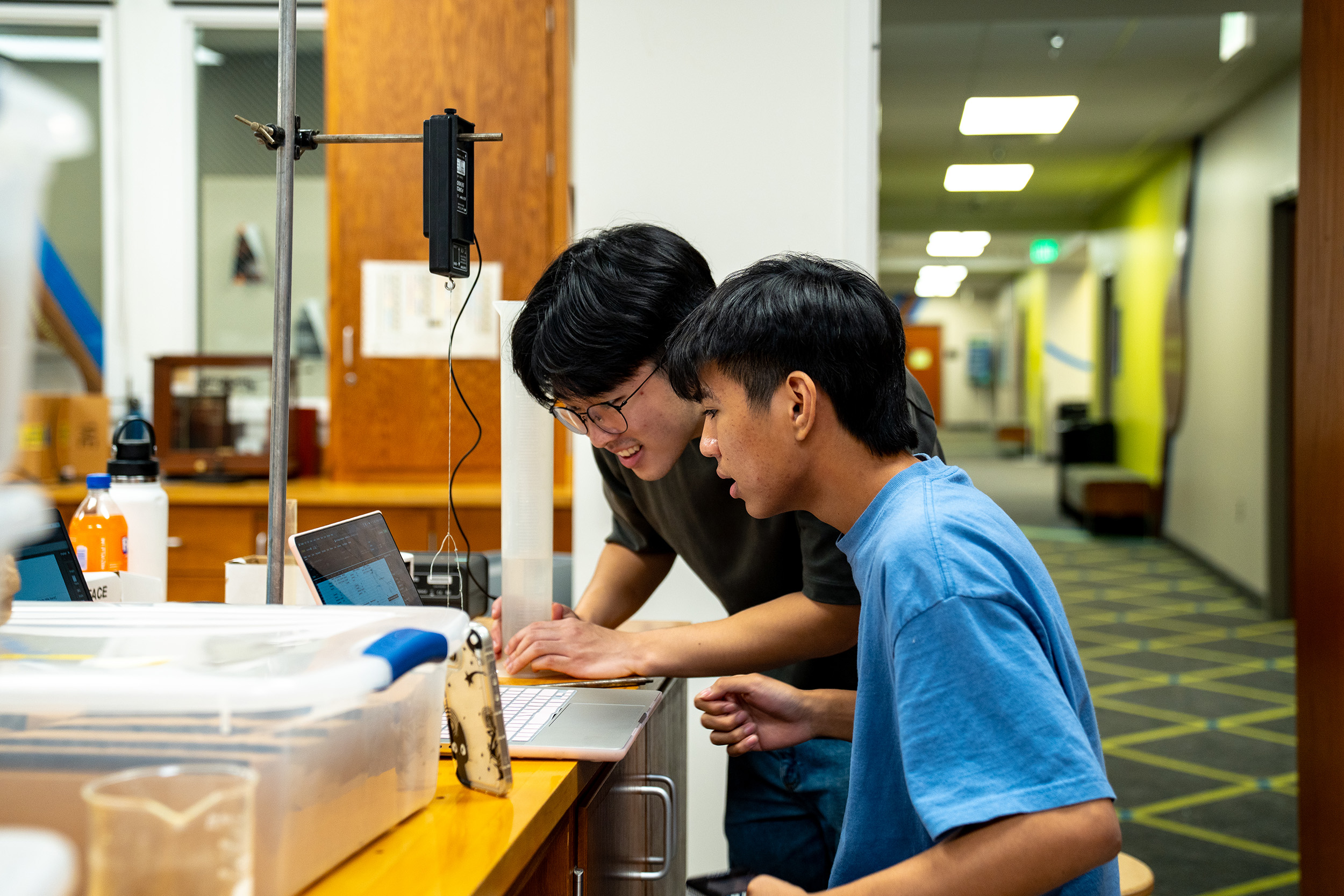 students work at a table