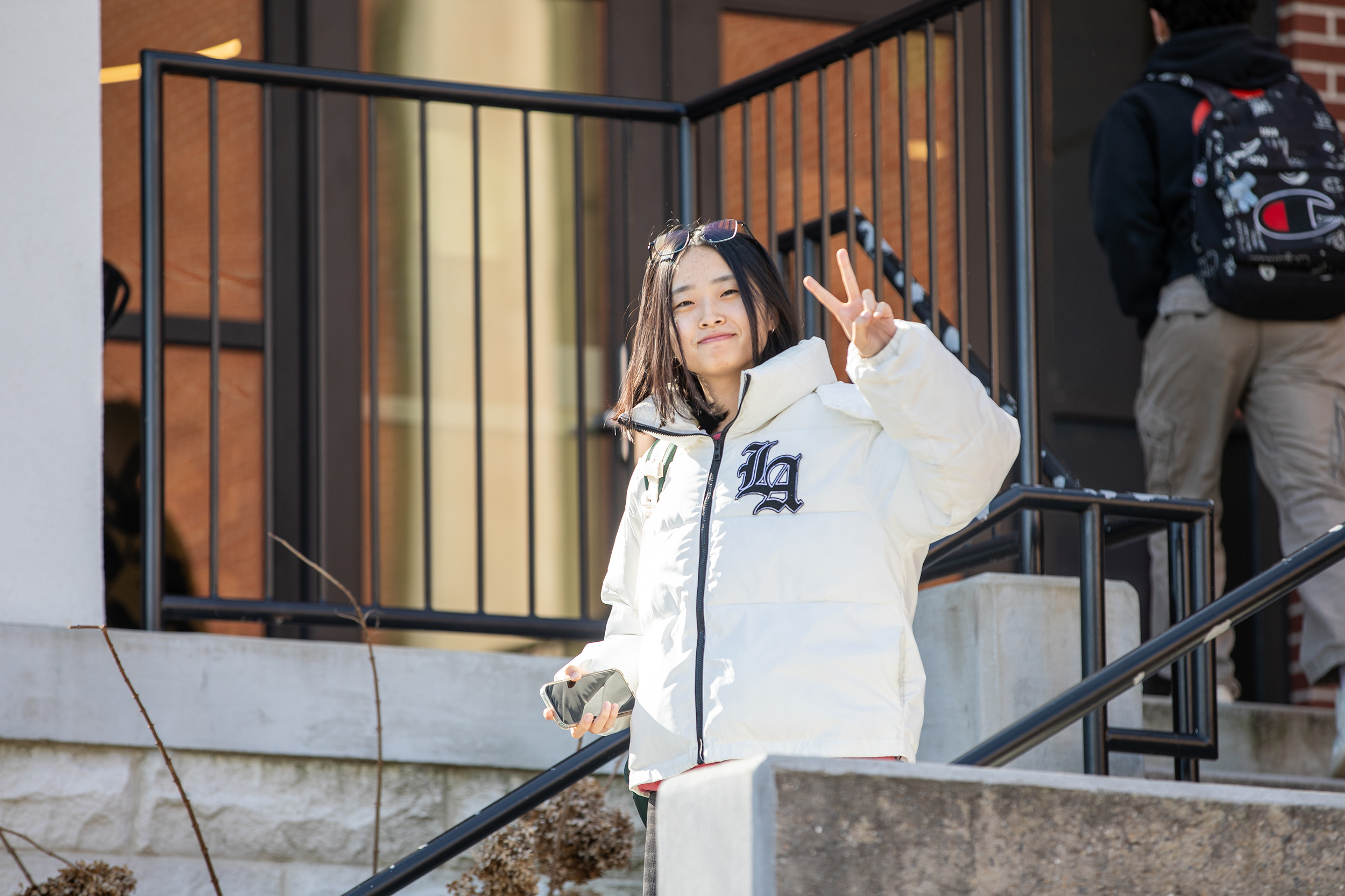 student on the sidewalk