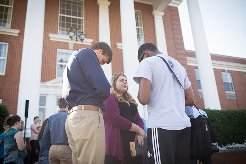 Faculty Praying
