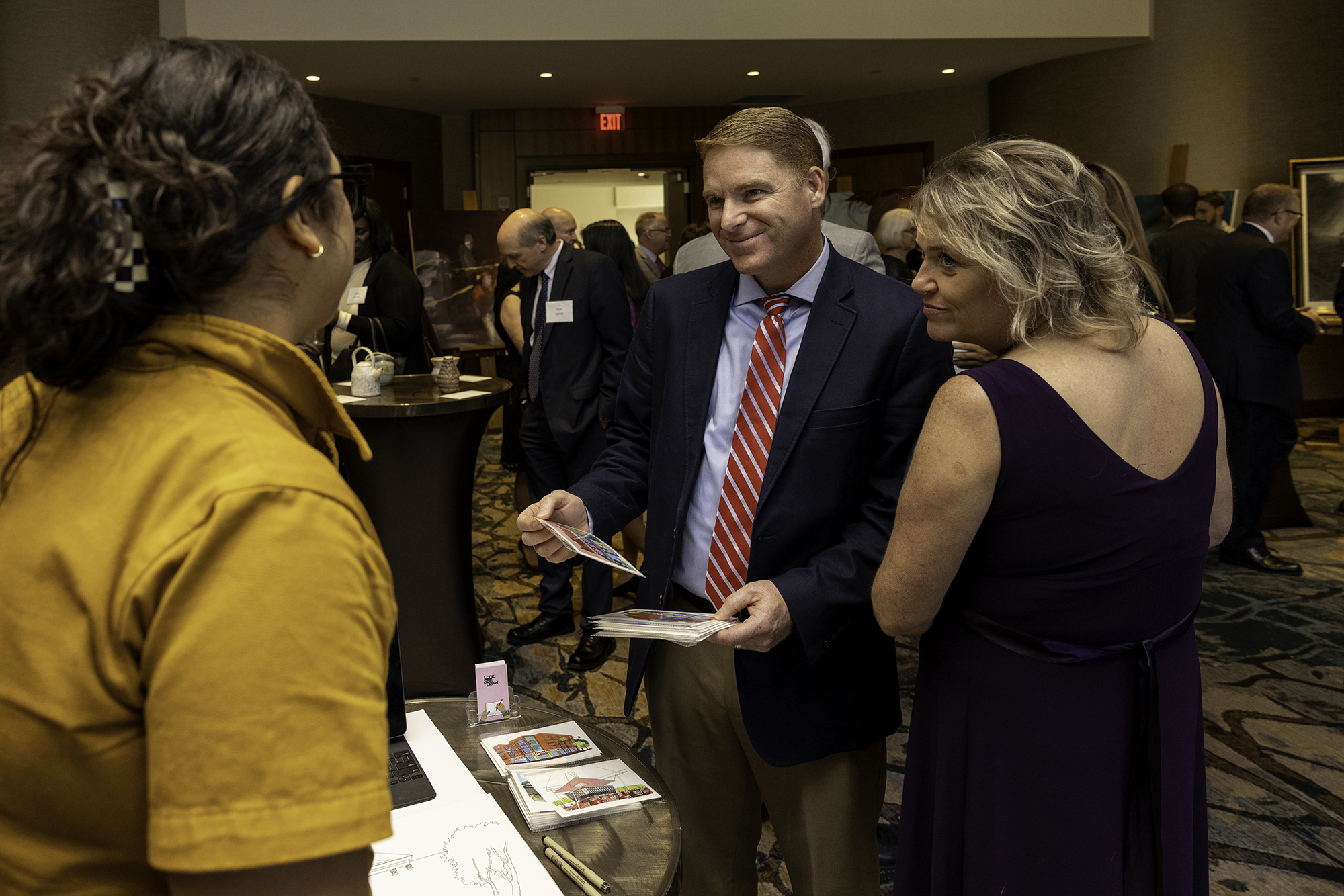 three people talking