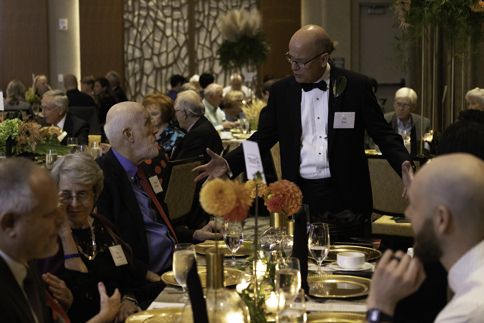 Ken Shaw talking to a group of people