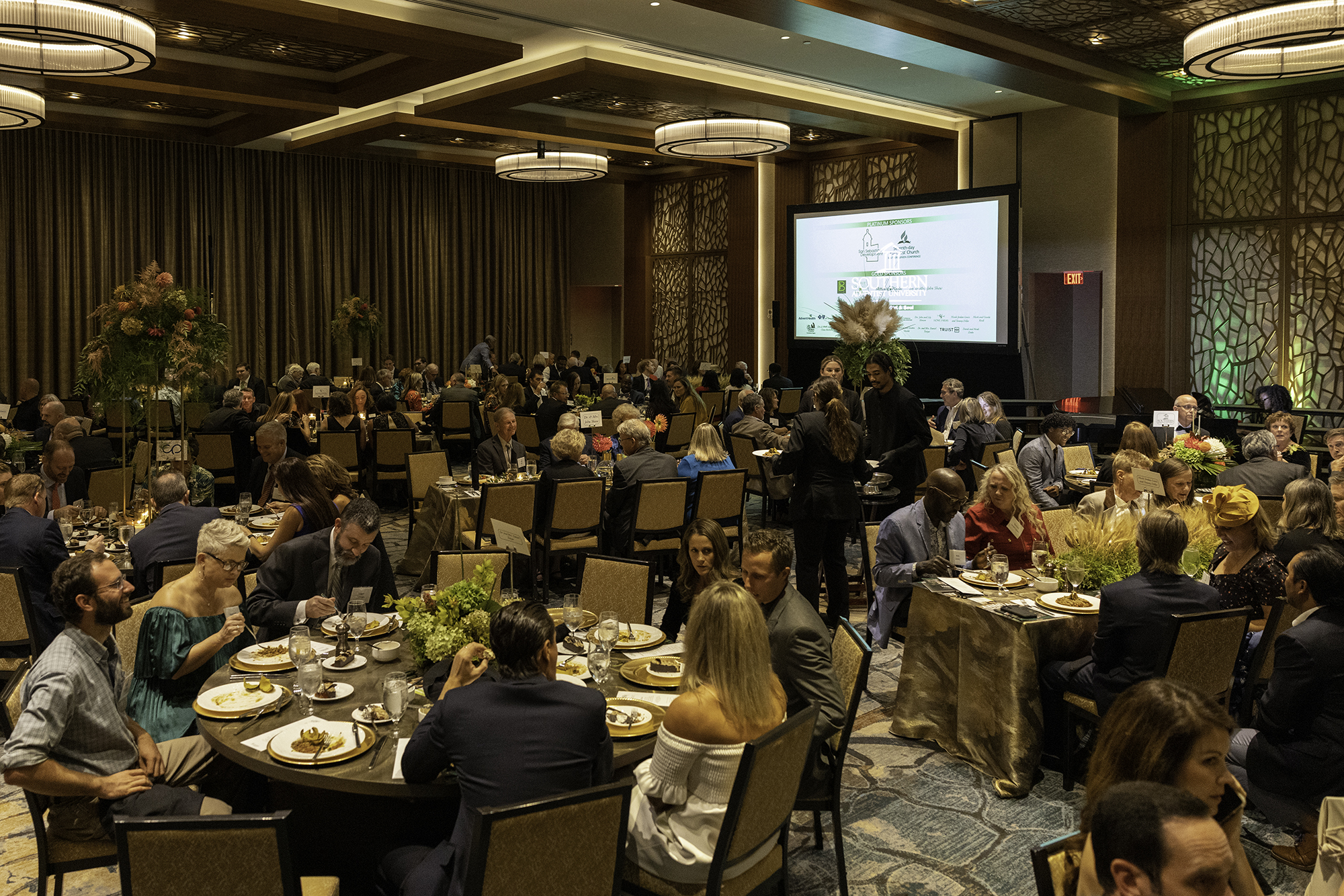 people sitting and eating