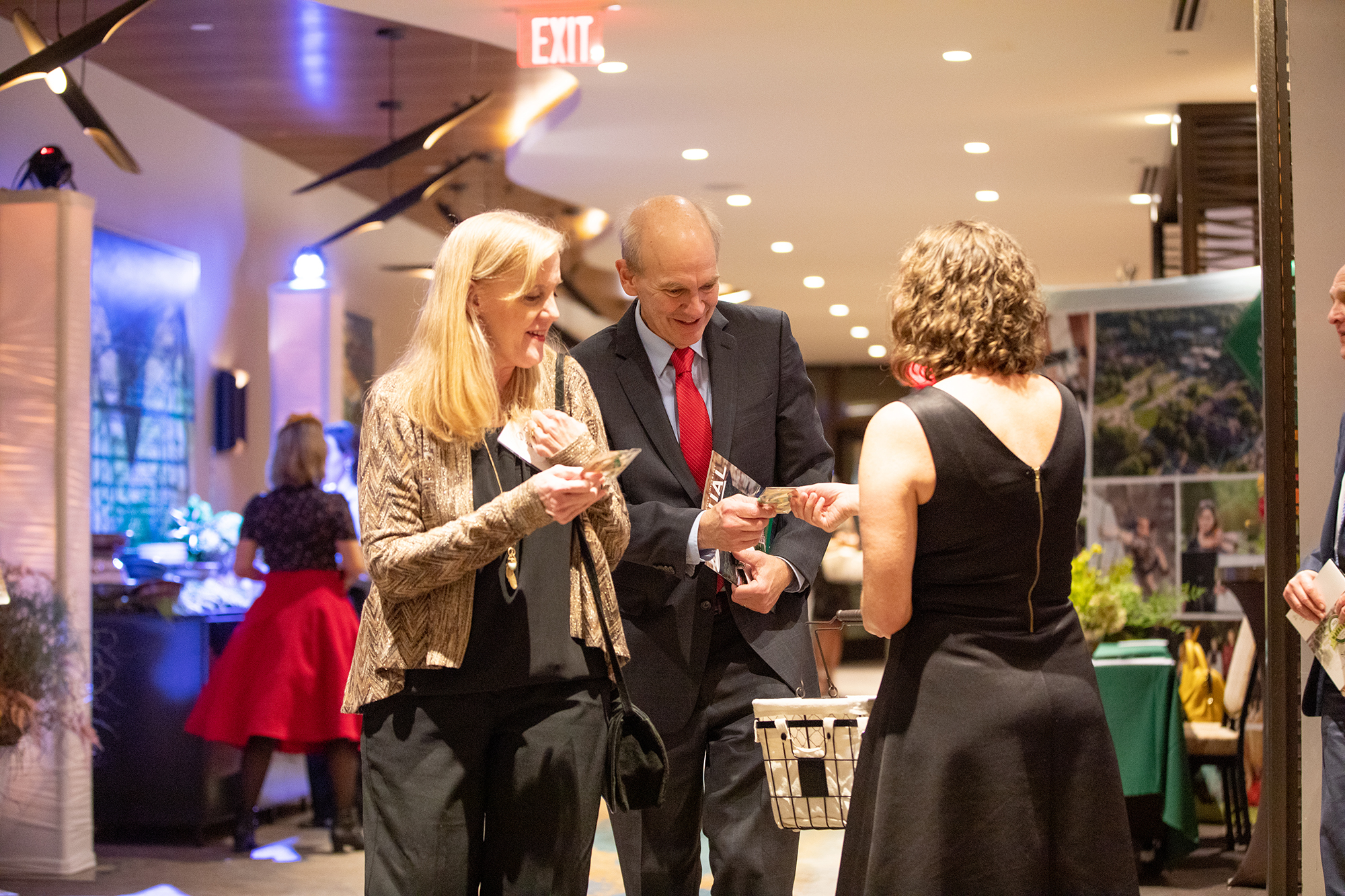 three people talking