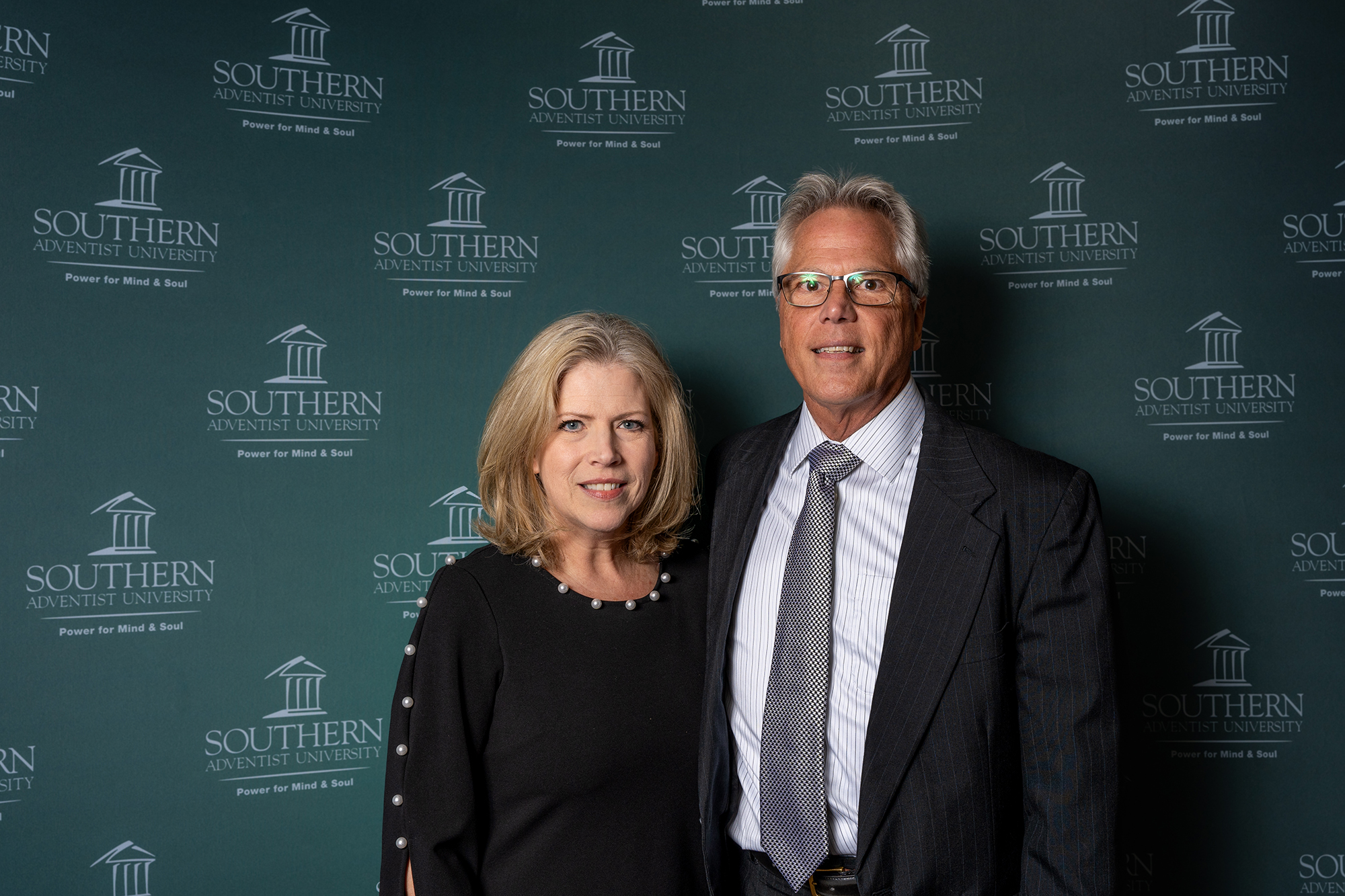 two people taking a photo