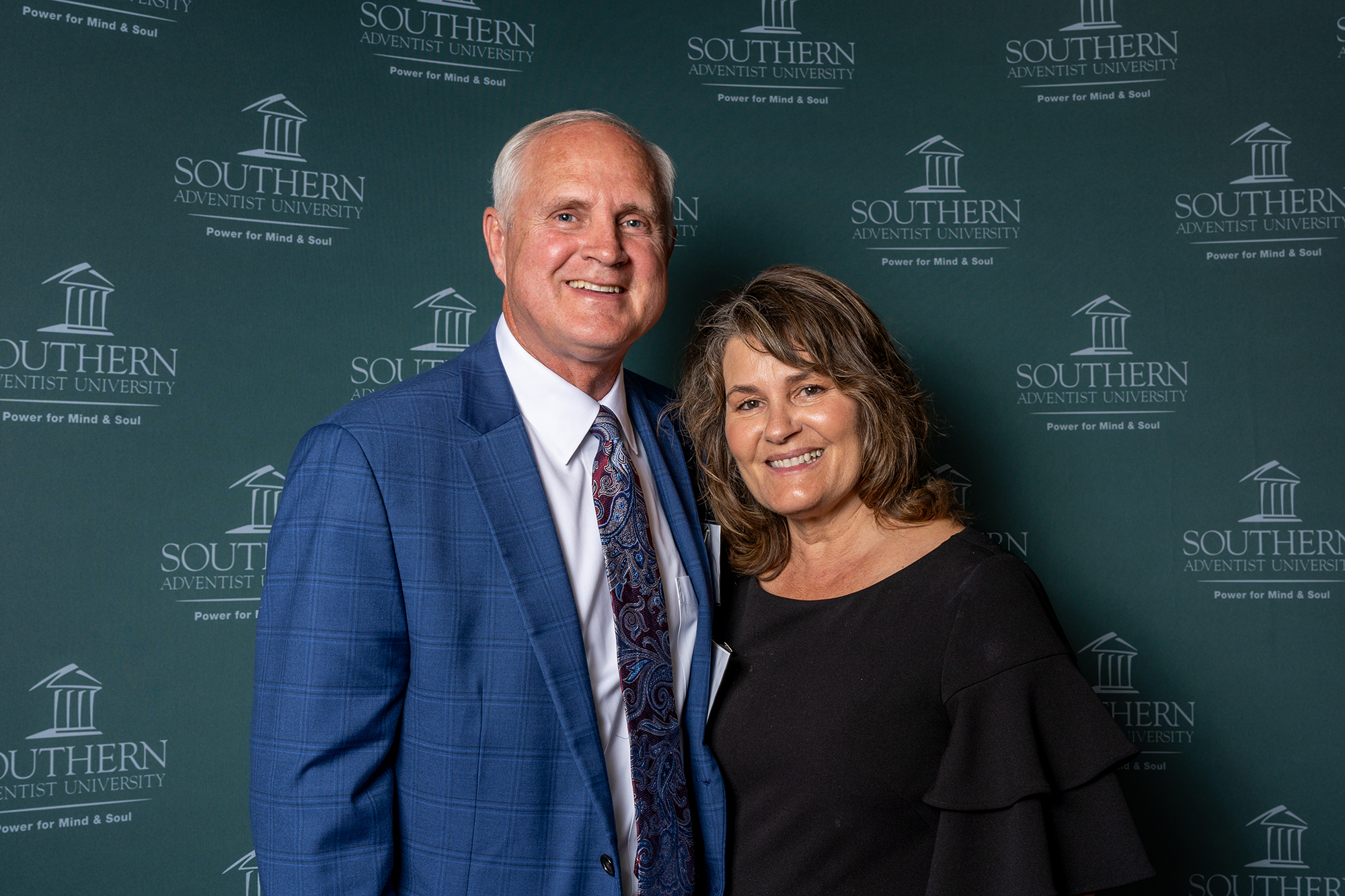 two people taking a photo