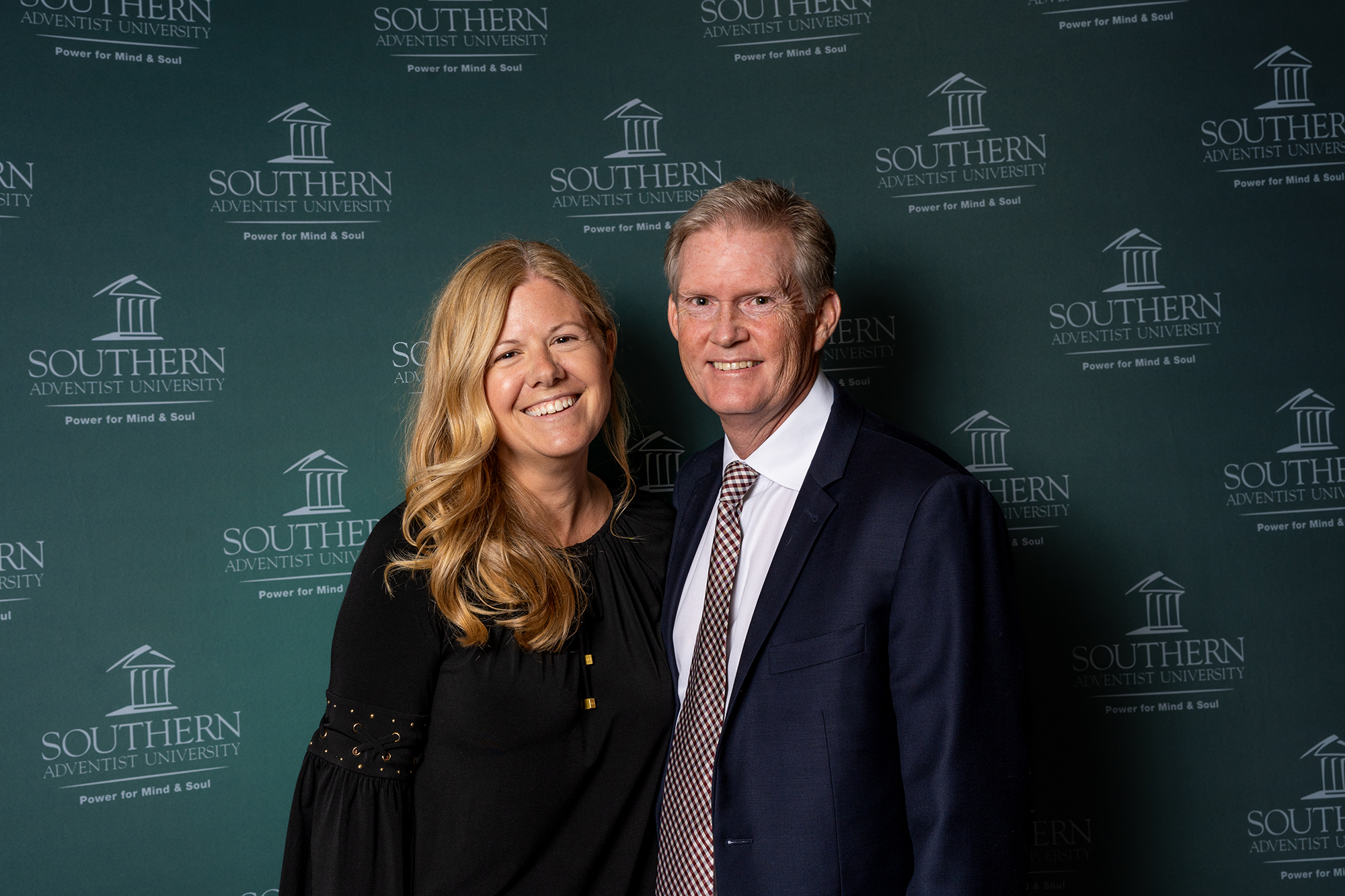 two people taking a photo