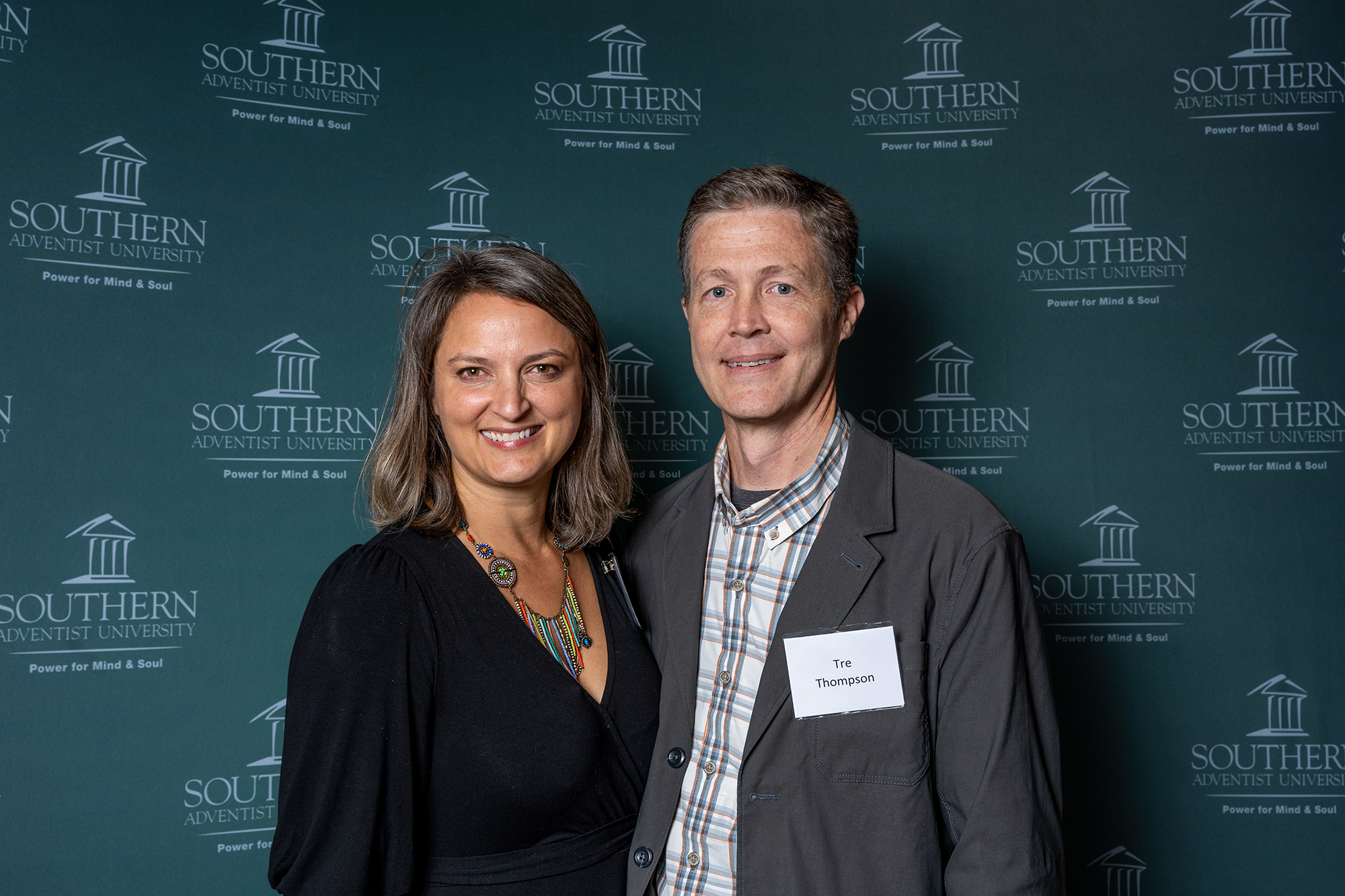 two people taking a photo