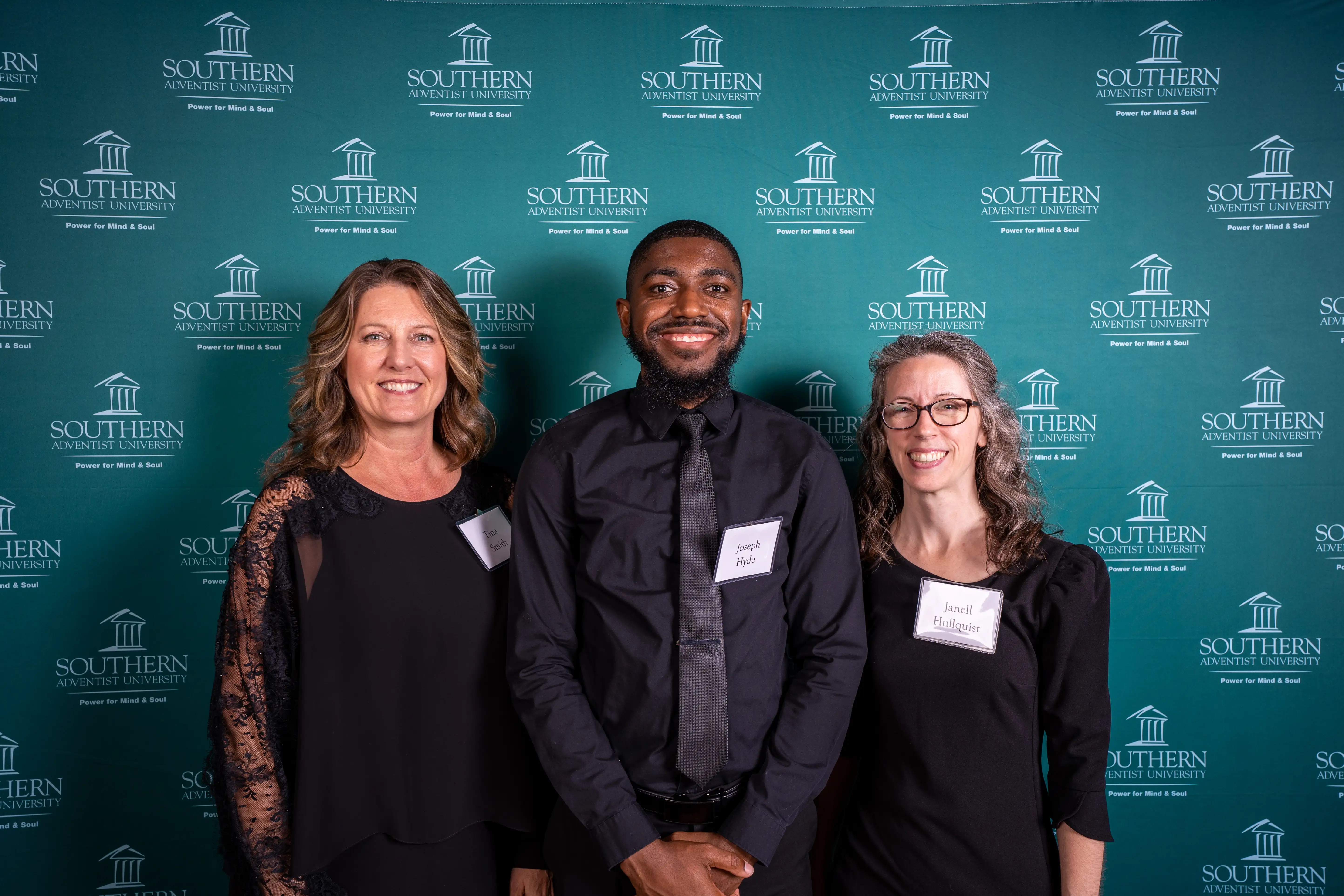 Tina Smith, '89, Joseph Hyde, '20, and Janell Hullquist, '05