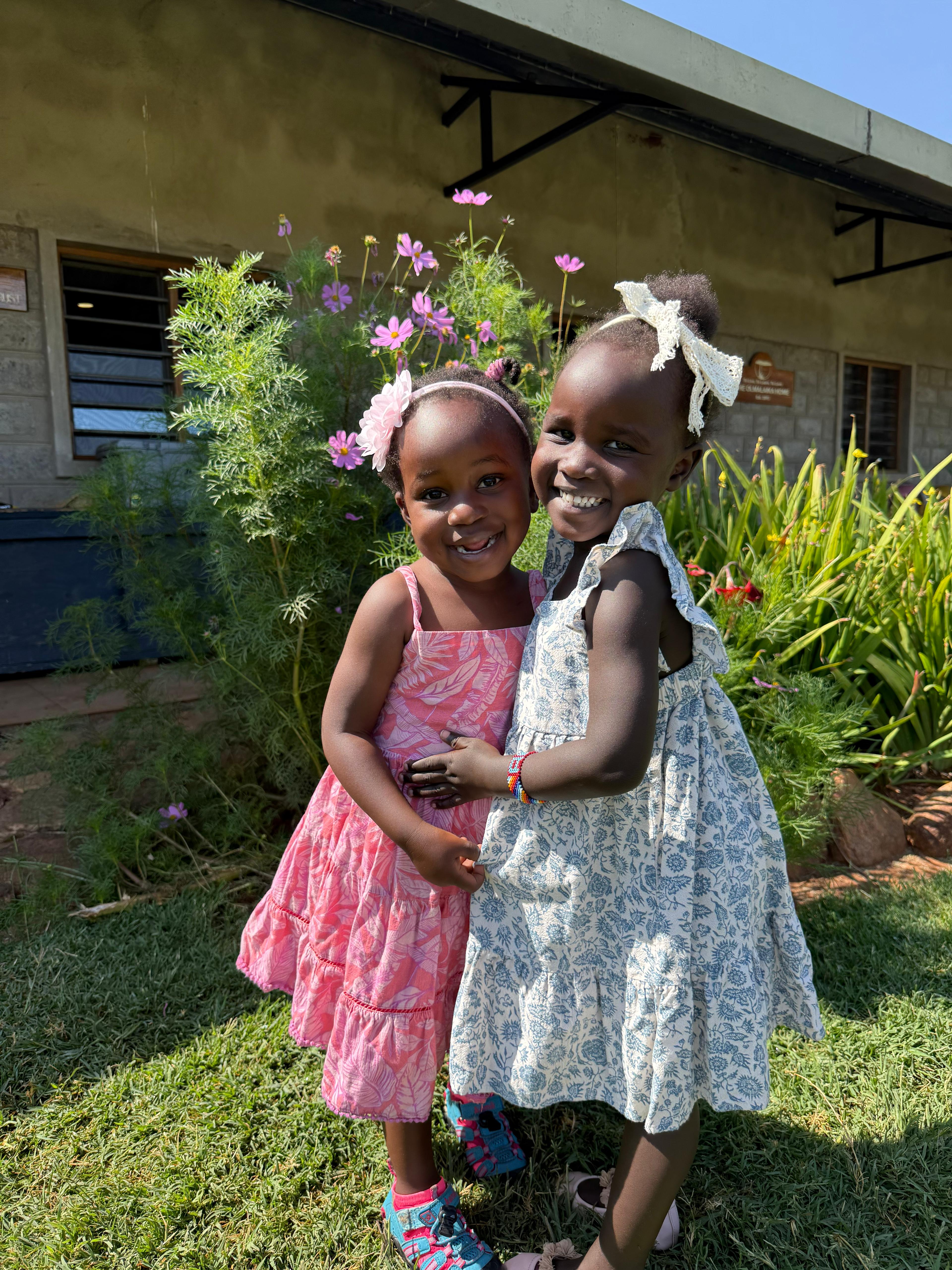 Two young girls at Olmalaika Home