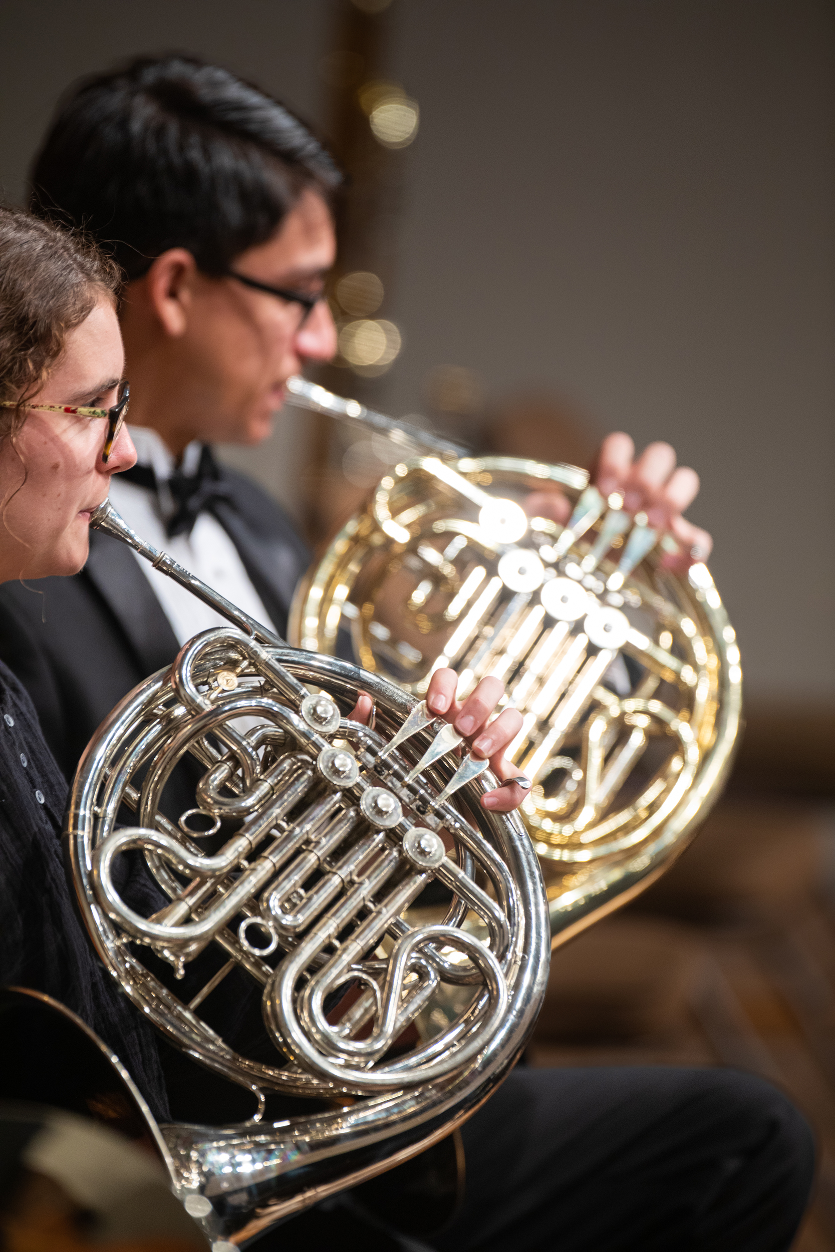 Two students from Southern's Symphony Orchestra play French horns