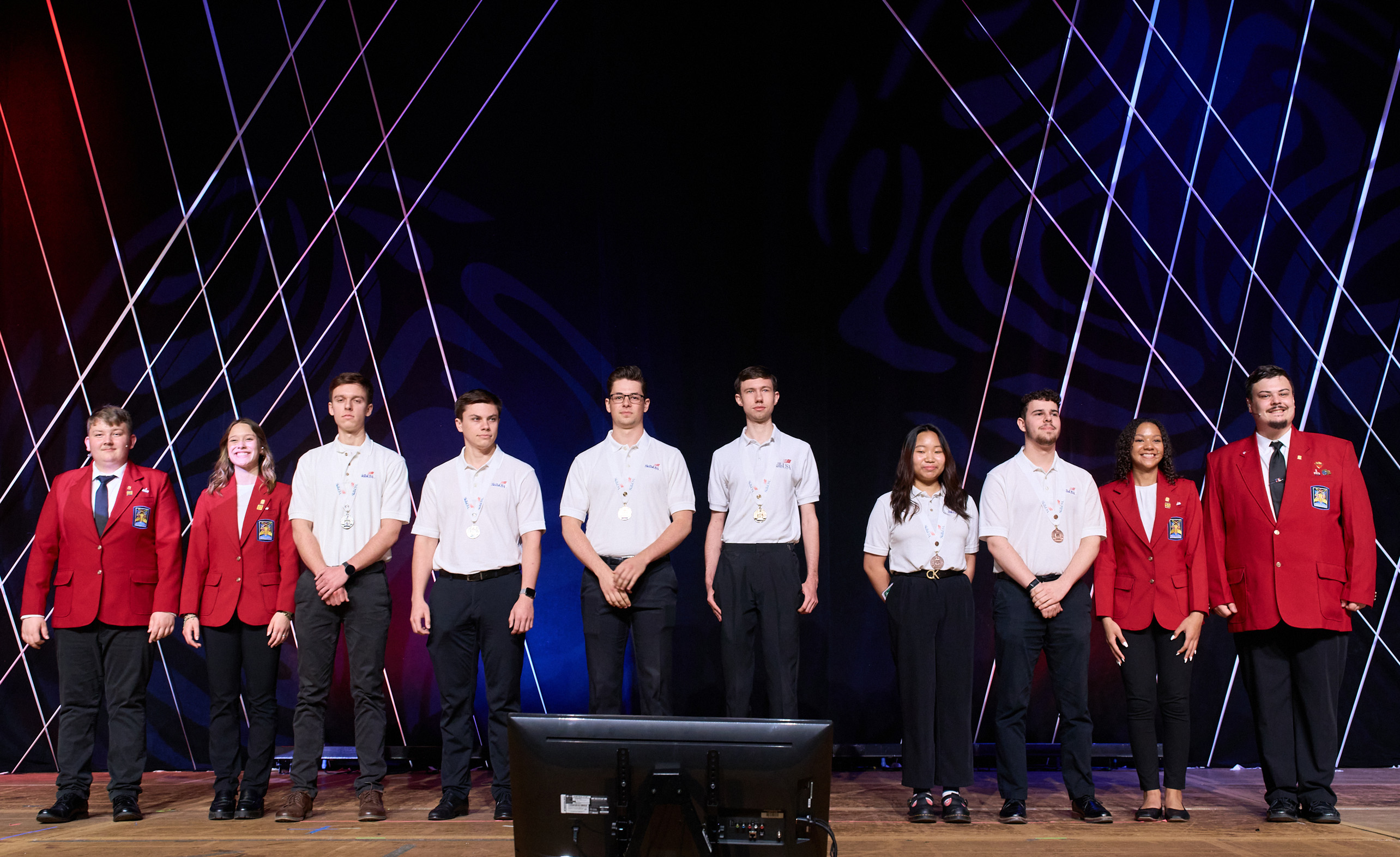 Southern students stand on stage at the SkillsUSA competition. 